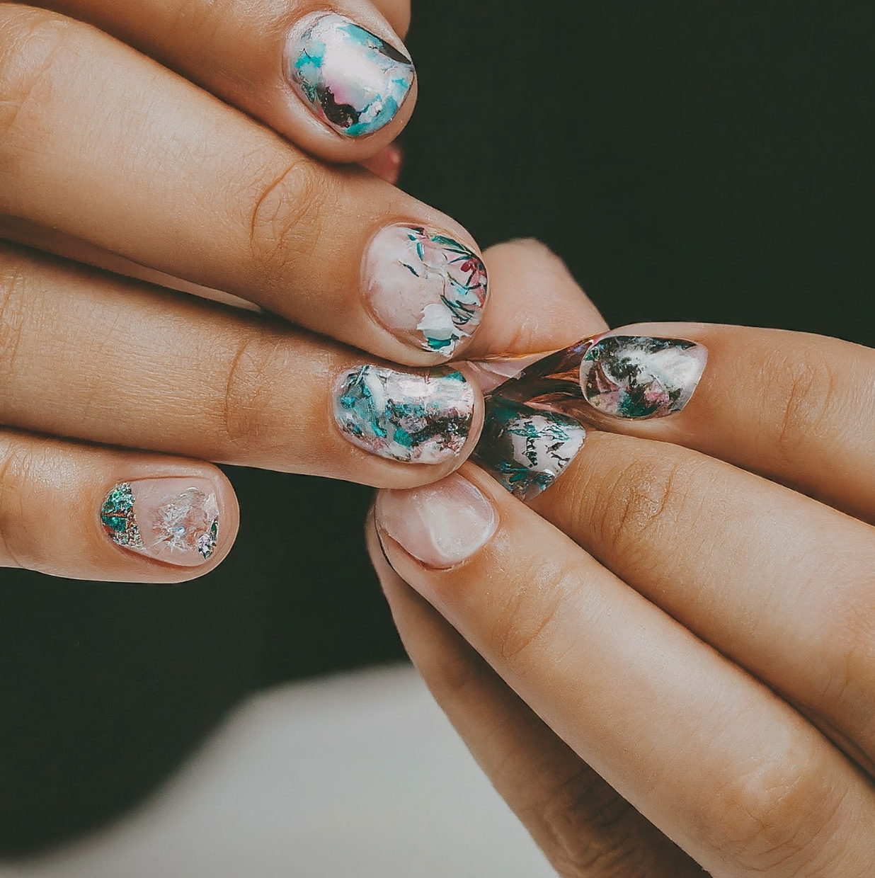 Unveiling the Magic of Foil and Blooming Gel in Nail Art